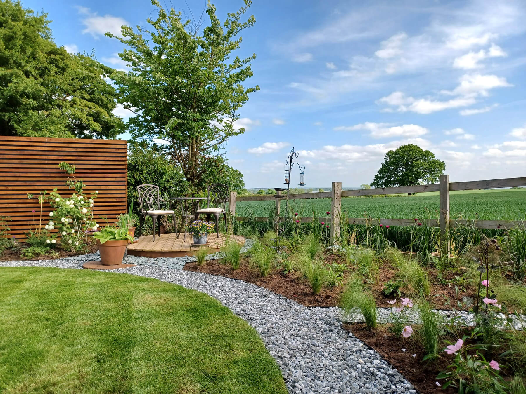 Garden Design with Prairie Planting and Seating Area