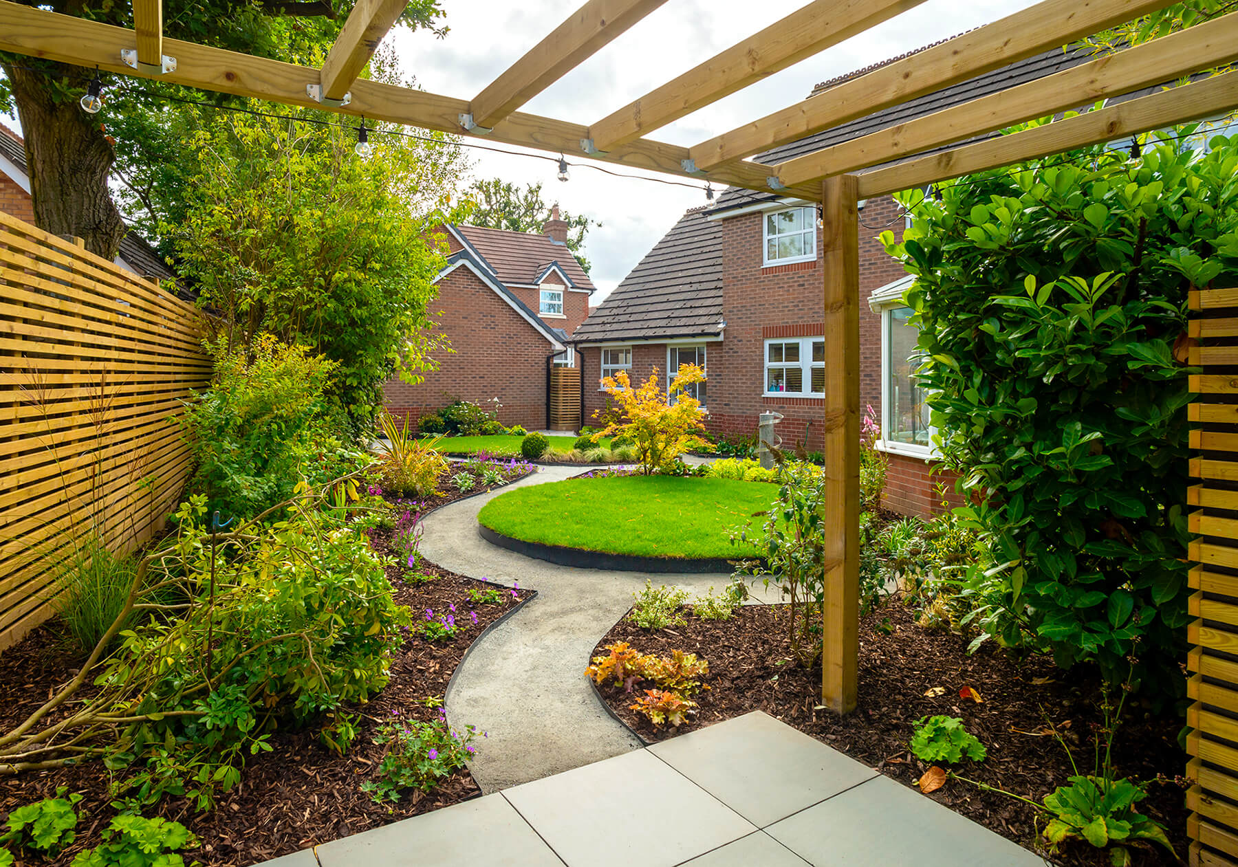 Garden Design with Patio Area and Water Feature with Planting Scheme